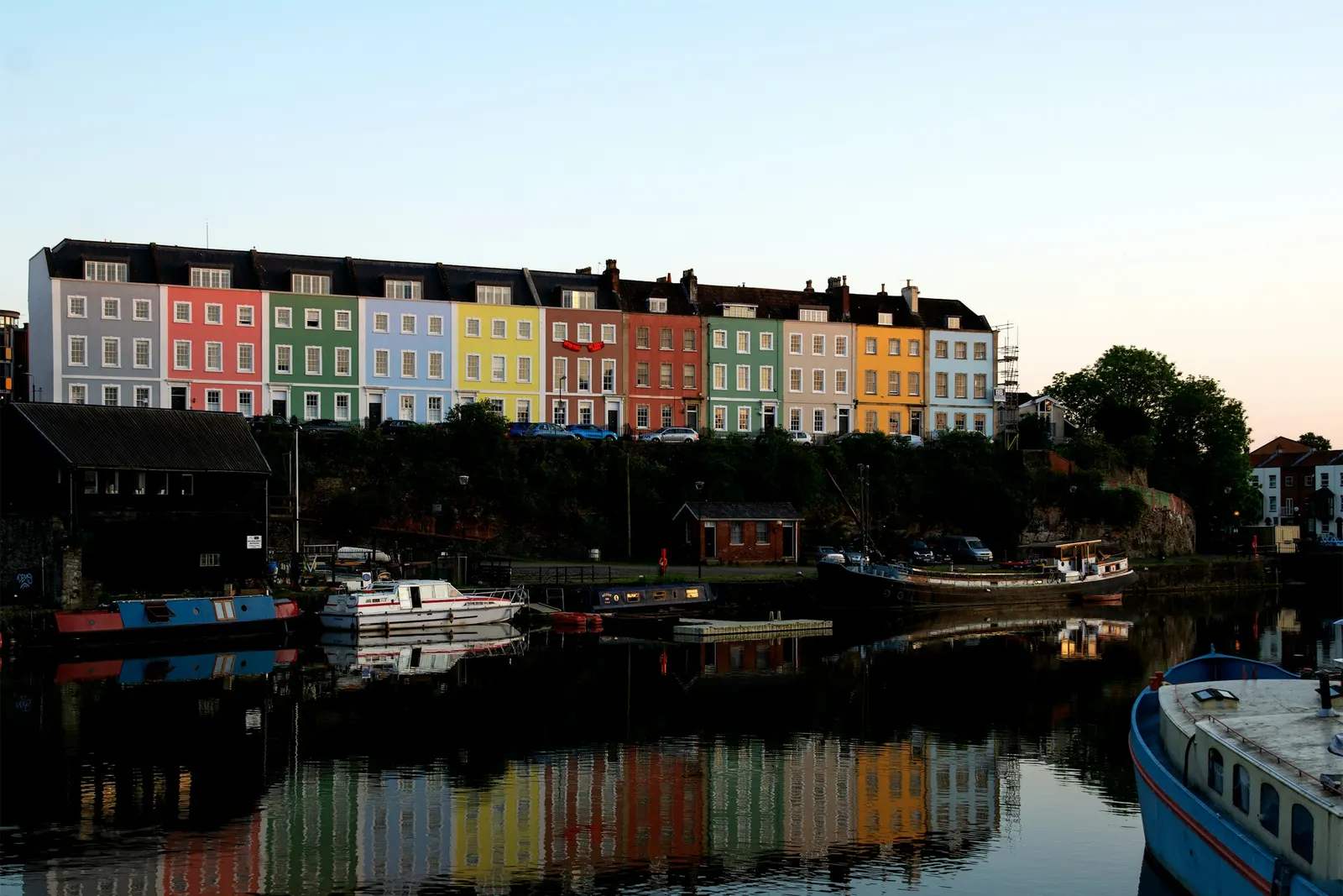 Coloured houses along the harbourside at dusk, Bristol