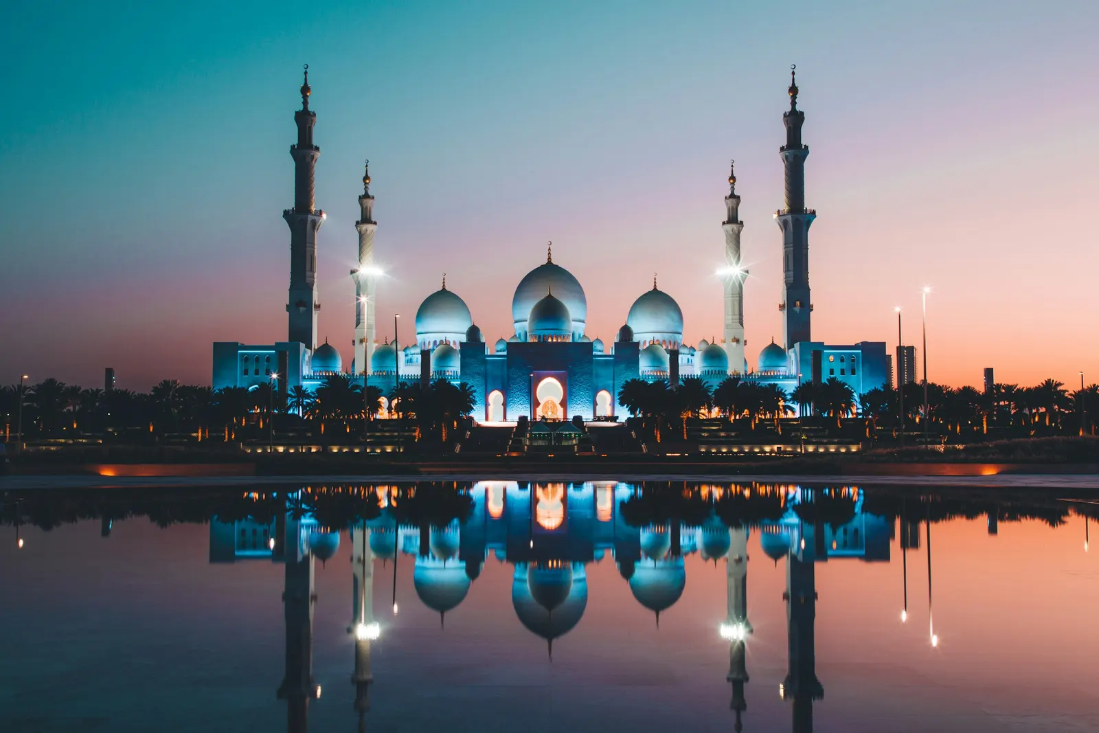 The Sheikh Zayed Grand Mosque reflected at low sun, Abu Dhabi
