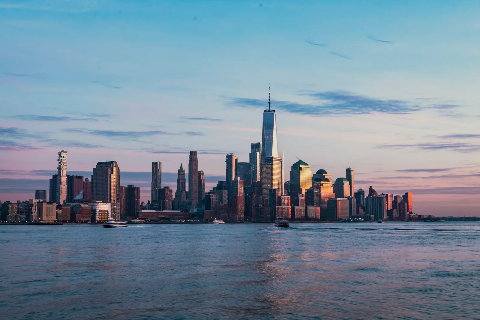 The Manhattan skyline across the Hudson at golden hour